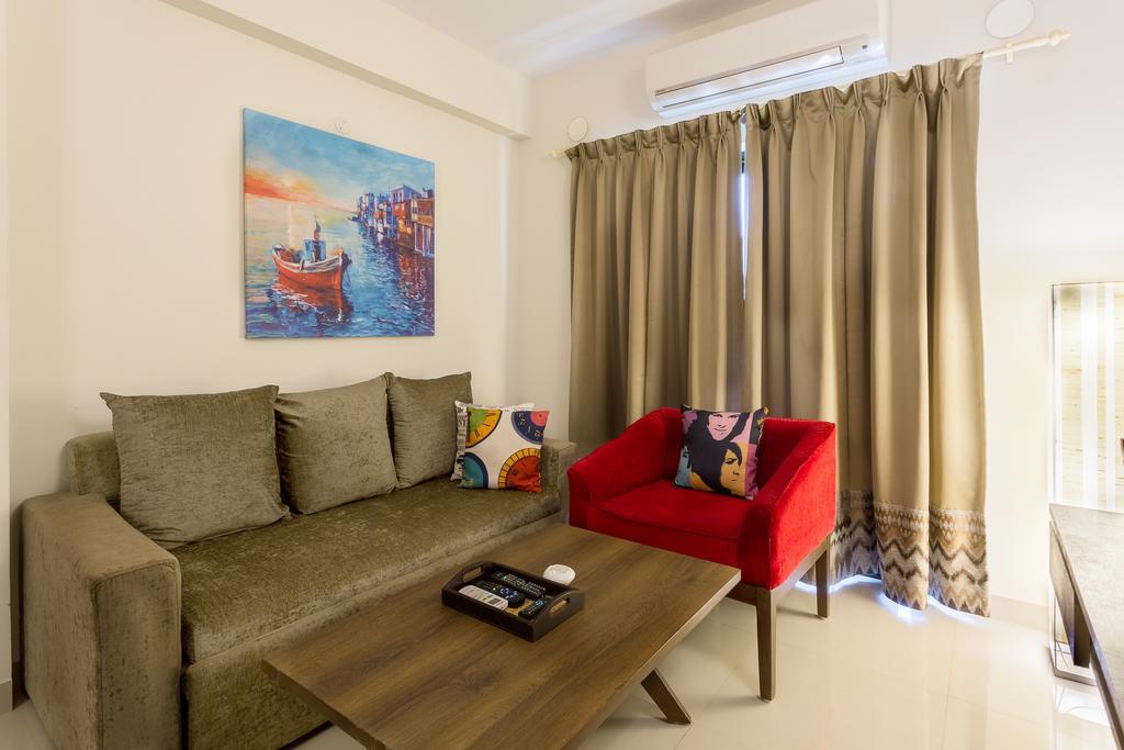 Treebo Trend Zeebo Suites Arpora Bagian luar foto