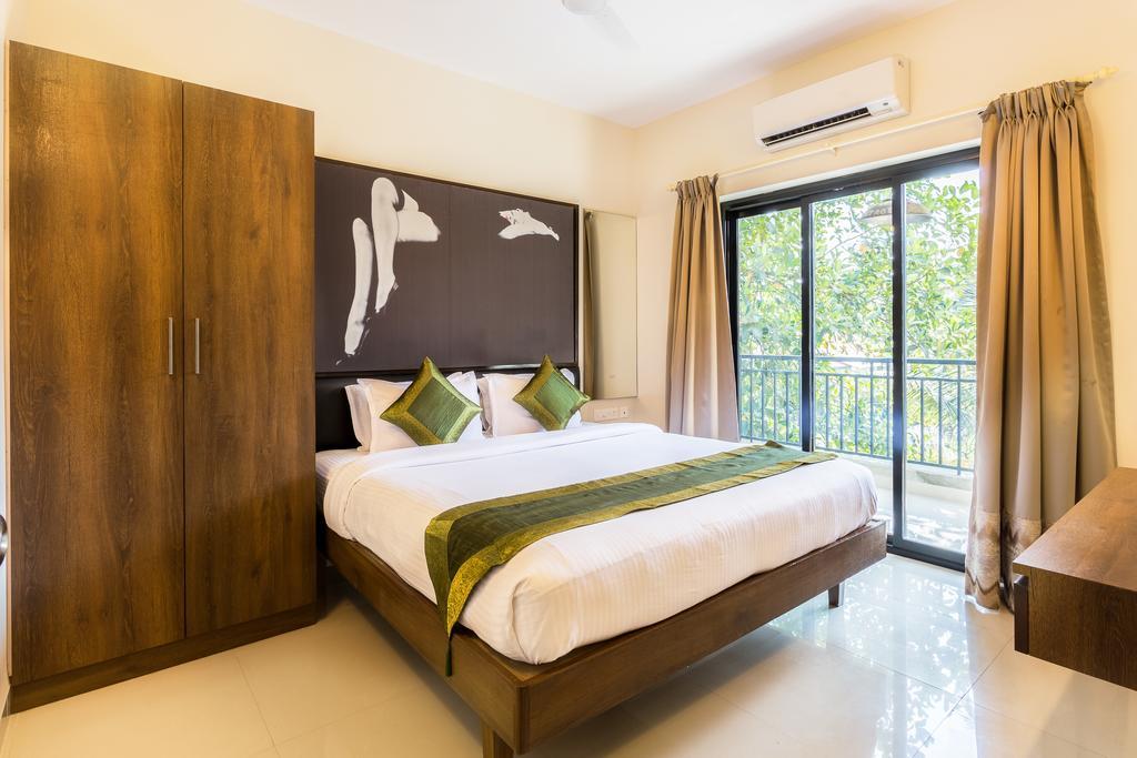 Treebo Trend Zeebo Suites Arpora Bagian luar foto