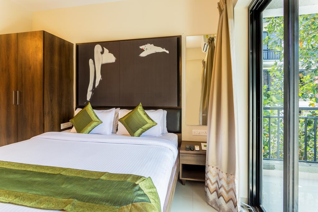 Treebo Trend Zeebo Suites Arpora Bagian luar foto