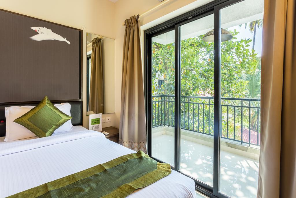 Treebo Trend Zeebo Suites Arpora Bagian luar foto