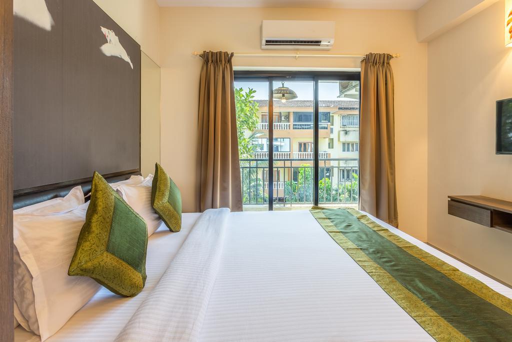 Treebo Trend Zeebo Suites Arpora Bagian luar foto