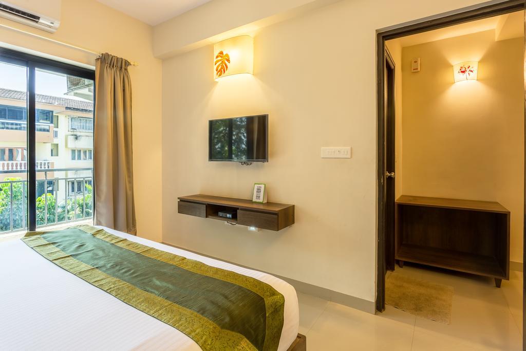 Treebo Trend Zeebo Suites Arpora Bagian luar foto