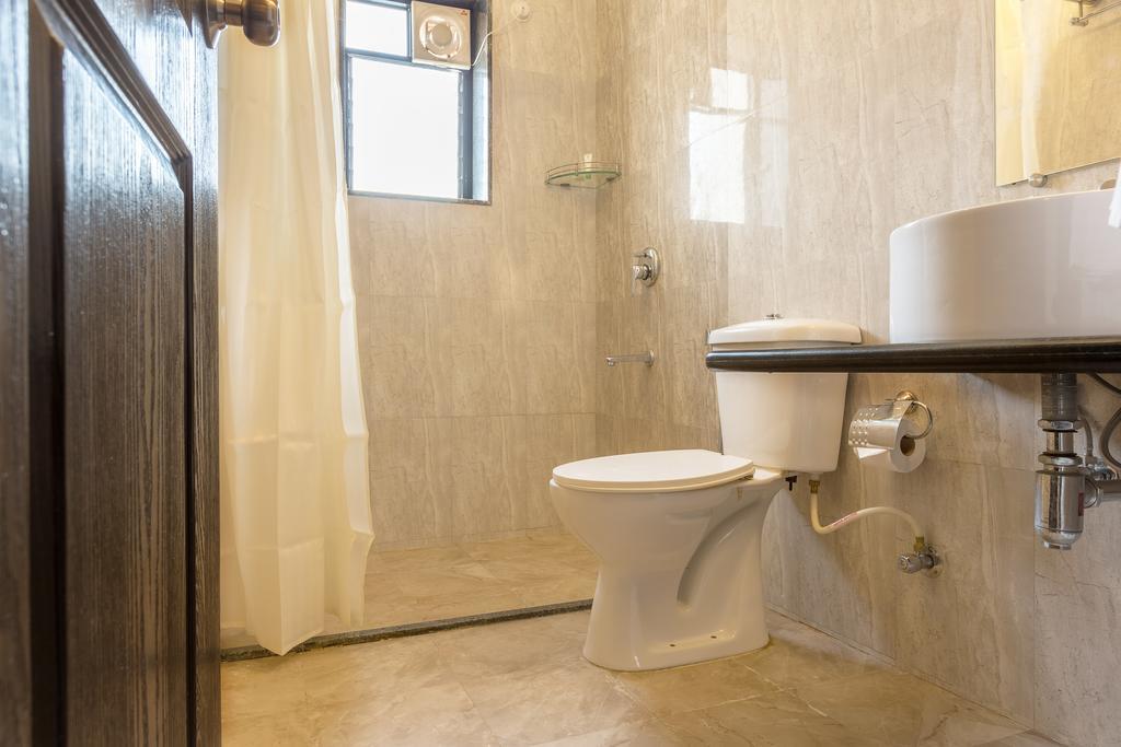 Treebo Trend Zeebo Suites Arpora Bagian luar foto