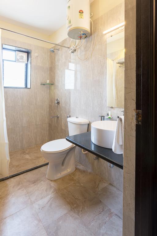 Treebo Trend Zeebo Suites Arpora Bagian luar foto